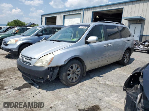 2009 Kia Sedona LX with VIN KNDMB233096296810, listed as a Copart auction lot 64614694 with 231,572 mi miles and Salvage Title. Bid and sale history available at carsss.com. Image 1.