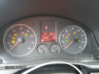 2009 Volkswagen Rabbit S z VIN WVWDB71K49W021674, wystawiony jako Copart lot #56115715 z przebiegiem 159 860 mil mil oraz Szkoda całkowita • Salvage title. Historia ofert i sprzedaży dostępna na DreamBid. Obrazek 9.
