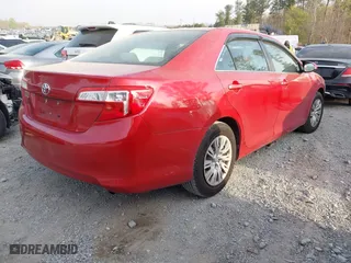 2014 Toyota Camry L with VIN 4T1BF1FK3EU770985, listed as a IAAI auction lot 41896125 with 146,100 mi miles. Bid and sale history available at carsss.com. Image 4.