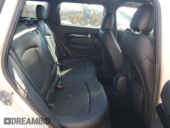 2017 MINI Clubman Cooper S with VIN WMWLN9C31H2E49891, listed as a Copart auction lot 74787744 with 100,347 mi miles and Salvage Title. Bid and sale history available at carsss.com. Image 10.