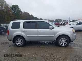 2010 Honda Pilot Touring with VIN 5FNYF3H89AB005861, listed as a IAAI auction lot 40828747 with 275,757 mi miles and . Bid and sale history available at DreamBid. Image 13.