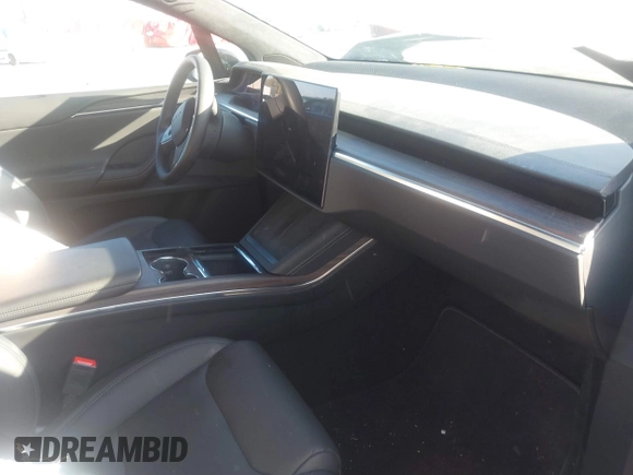 2023 Tesla Model X with VIN 7SAXCDE59PF430836, listed as a IAAI auction lot 41545267 with Not Provided miles and . Bid and sale history available at DreamBid. Image 5.