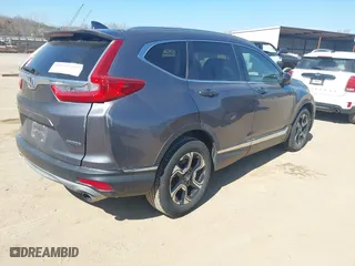 2019 Honda CR-V Touring with VIN 7FARW1H98KE007592, listed as a IAAI auction lot 41711030 with 58,118 mi miles. Bid and sale history available at carsss.com. Image 4.