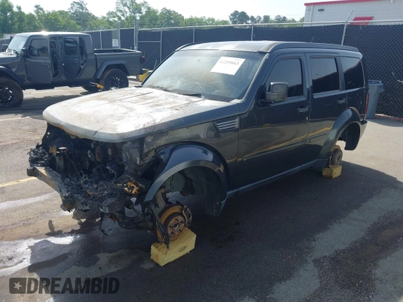 2011 Dodge Nitro Heat z VIN 1D4PT4GX1BW506231, wystawiony jako IAAI lot #42259663 z przebiegiem 179 355 mil mil oraz . Historia ofert i sprzedaży dostępna na DreamBid. Obrazek 2.