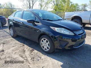 2011 Ford Fiesta SE with VIN 3FADP4BJ4BM144991, listed as a IAAI auction lot 42202406 with 67,448 mi miles and . Bid and sale history available at carsss.com. Image 1.