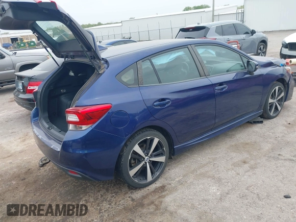 2017 Subaru Impreza Special Sports z VIN 4S3GTAM62H3700557, wystawiony jako IAAI lot #42055439 z przebiegiem 94 920 mil mil oraz . Historia ofert i sprzedaży dostępna na DreamBid. Obrazek 4.