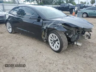 2022 Tesla Model 3 Long Range with VIN 5YJ3E1EB1NF243484, listed as a Copart auction lot 70745404 with 25,970 mi miles and Salvage Title. Bid and sale history available at DreamBid. Image 4.
