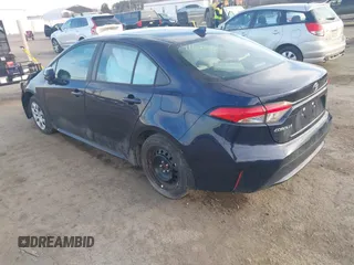 2022 Toyota Corolla LE with VIN 5YFEPMAE9NP306727, listed as a IAAI auction lot 41601452 with 29,969 mi miles and . Bid and sale history available at DreamBid. Image 3.