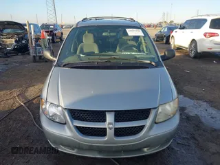 2003 Dodge Grand Caravan with VIN 2D4GP443X3R277421, listed as a IAAI auction lot 41035290 with 243,568 mi miles and . Bid and sale history available at DreamBid. Image 12.