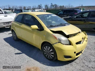 2009 Toyota Yaris with VIN JTDJT903195276164, listed as a Copart auction lot 50129115 with 165,824 mi miles and Salvage Title. Bid and sale history available at carsss.com. Image 4.