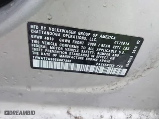 2014 Volkswagen Passat Wolfsburg Ed with VIN 1VWAT7A39EC067390, listed as a IAAI auction lot 41555240 with 151,147 mi miles. Bid and sale history available at carsss.com. Image 9.