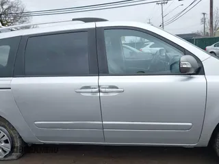 2012 Kia Sedona LX with VIN KNDMG4C72C6485952, listed as a IAAI auction lot 42029147 with 129,296 mi miles. Bid and sale history available at carsss.com. Image 13.