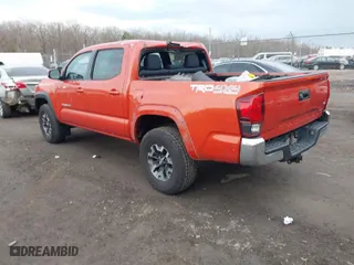 2018 Toyota Tacoma SR with VIN 3TMCZ5AN4JM161623, listed as a IAAI auction lot 41677439 with 75,549 mi miles. Bid and sale history available at carsss.com. Image 3.