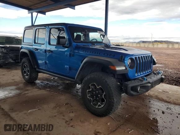 2023 Jeep Wrangler Rubicon with VIN 1C4JJXR69PW581362, listed as a Copart auction lot 58557795 with 34,357 mi miles and Salvage title. Bid and sale history available at DreamBid. Image 4.