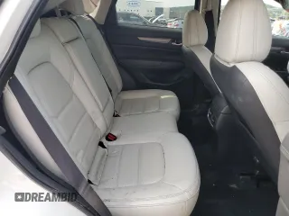 2021 Mazda CX-5 Touring with VIN JM3KFACM1M0405129, listed as a Copart auction lot 67874724 with 49,618 mi miles and Salvage Title. Bid and sale history available at carsss.com. Image 11.