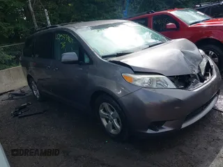 2015 Toyota Sienna LE AAS with VIN 5TDKK3DC8FS632906, listed as a IAAI auction lot 42533867 with 128,980 mi miles and . Bid and sale history available at DreamBid. Image 1.