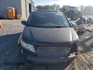 2014 Honda Odyssey Touring z VIN 5FNRL5H90EB007862, wystawiony jako Copart lot #60470005 z przebiegiem 135 686 mil mil oraz Czysty tytuł • Clean title. Historia ofert i sprzedaży dostępna na DreamBid. Obrazek 5.