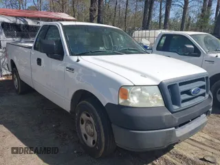 2005 Ford F-150 XL with VIN 1FTRF12W35NB51017, listed as a IAAI auction lot 41893398 with 243,334 mi miles. Bid and sale history available at carsss.com. Image 1.