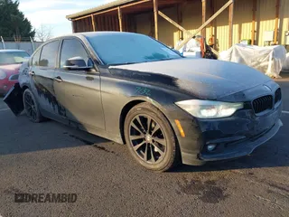 2017 BMW 3 Series 320i with VIN WBA8E1G50HNU12930, listed as a IAAI auction lot 41372048 with 100,852 mi miles. Bid and sale history available at carsss.com. Image 1.
