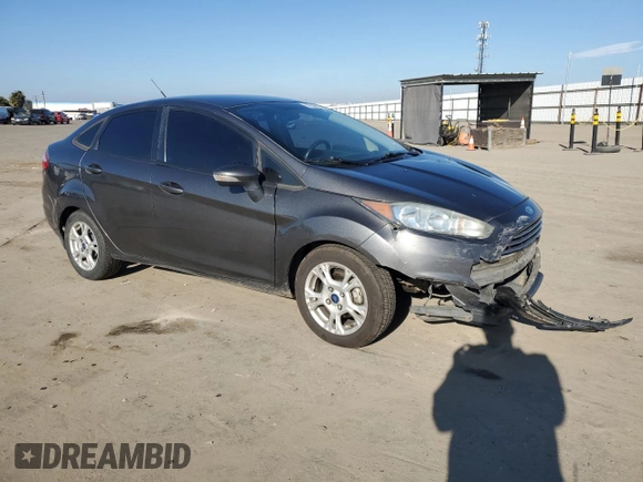 2015 Ford Fiesta SE with VIN 3FADP4BJ0FM115297, listed as a Copart auction lot 87942225 with 198,940 mi miles and Salvage Title. Bid and sale history available at DreamBid. Image 4.