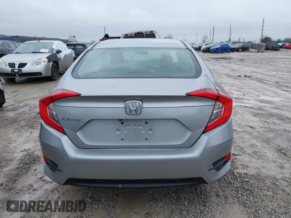 2017 Honda Civic LX z VIN 2HGFC2F51HH562496, wystawiony jako IAAI lot #41524243 z przebiegiem Nie podano mil oraz . Historia ofert i sprzedaży dostępna na DreamBid. Obrazek 15.