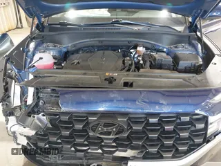 2023 Hyundai Santa Fe SE z VIN 5NMS1DAJ3PH592136, wystawiony jako IAAI lot #42263727 z przebiegiem 21 102 mil mil oraz . Historia ofert i sprzedaży dostępna na DreamBid. Obrazek 10.