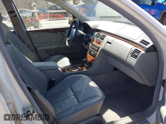 1999 Mercedes-Benz E-Class with VIN WDBJF82H4XX025925, listed as a IAAI auction lot 41839398 with 238,583 mi miles. Bid and sale history available at carsss.com. Image 5.