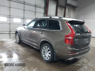 2016 Volvo XC90 T6 Momentum with VIN YV4A22PK6G1022376, listed as a IAAI auction lot 41595150 with 128,877 mi miles. Bid and sale history available at carsss.com. Image 3.