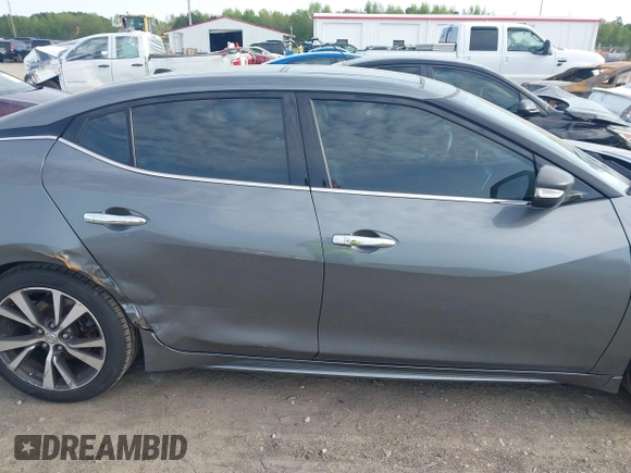 2016 Nissan Maxima SL with VIN 1N4AA6AP8GC430051, listed as a IAAI auction lot 41983059 with 166,786 mi miles and . Bid and sale history available at DreamBid. Image 13.