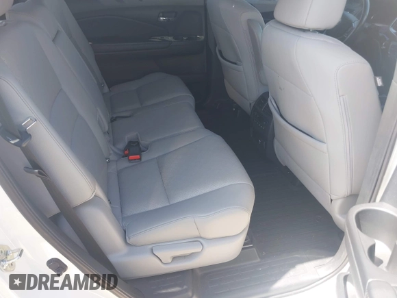 2019 Honda Passport Elite z VIN 5FNYF8H0XKB000774, wystawiony jako IAAI lot #42153669 z przebiegiem 65 415 mil mil oraz . Historia ofert i sprzedaży dostępna na DreamBid. Obrazek 8.