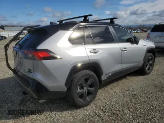 2021 Toyota RAV4 Hybrid XSE with VIN 4T3E6RFV1MU057403, listed as a Copart auction lot 47809415 with 56,570 mi miles and Salvage Title. Bid and sale history available at carsss.com. Image 3.