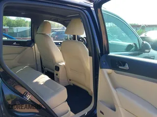 2014 Volkswagen Tiguan S z VIN WVGBV3AX5EW560393, wystawiony jako IAAI lot #42105203 z przebiegiem 102 001 mil mil oraz . Historia ofert i sprzedaży dostępna na DreamBid. Obrazek 8.