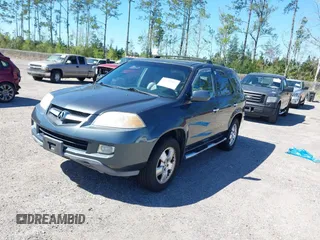 2004 Acura MDX with VIN 2HNYD18234H508252, listed as a IAAI auction lot 41792452 with 336,087 mi miles. Bid and sale history available at carsss.com. Image 2.