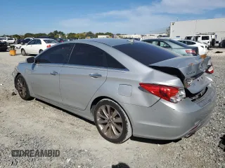2013 Hyundai Sonata Limited with VIN 5NPEC4AC3DH726943, listed as a Copart auction lot 43022065 with 140,965 mi miles and Salvage Title. Bid and sale history available at DreamBid. Image 2.