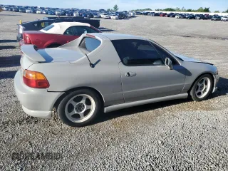 1997 Honda del Sol Si z VIN JHMEH626XVS005784, wystawiony jako Copart lot #57404985 z przebiegiem 254 850 mil mil oraz Szkoda całkowita • Salvage title. Historia ofert i sprzedaży dostępna na DreamBid. Obrazek 3.
