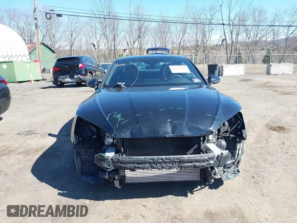 2019 Audi A5 Premium Plus with VIN WAUTNAF54KA026957, listed as a IAAI auction lot 41744015 with 94,506 mi miles and . Bid and sale history available at DreamBid. Image 12.