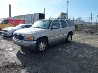 2004 GMC Yukon SLT with VIN 1GKEK13Z64J254137, listed as a IAAI auction lot 41499284 with 147,310 mi miles. Bid and sale history available at carsss.com. Image 2.