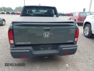 2018 Honda Ridgeline RTL-T with VIN 5FPYK3F61JB013733, listed as a IAAI auction lot 42548122 with 92,407 mi miles and . Bid and sale history available at DreamBid. Image 16.