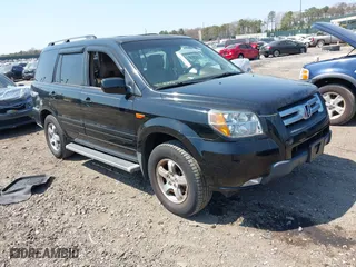 2007 Honda Pilot EX-L with VIN 2HKYF18537H502361, listed as a IAAI auction lot 42039836 with 167,431 mi miles. Bid and sale history available at carsss.com. Image 1.