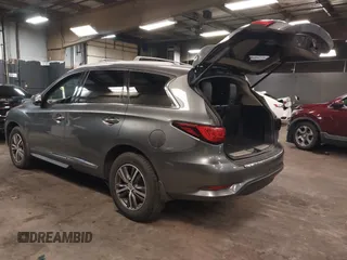2016 Infiniti QX60 with VIN 5N1AL0MM1GC526389, listed as a IAAI auction lot 41704458 with 103,931 mi miles and . Bid and sale history available at DreamBid. Image 3.
