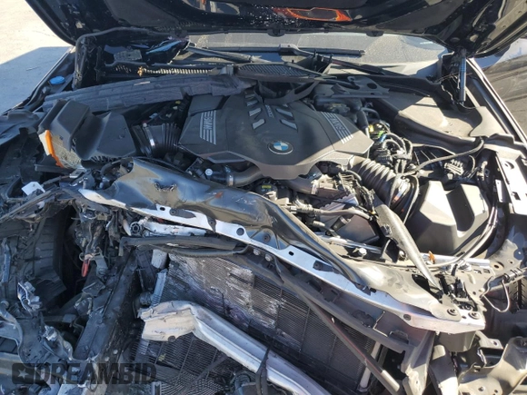 2021 BMW 5 Series M550i xDrive z VIN WBA13BK06MCF92173, wystawiony jako Copart lot #87707035 z przebiegiem Nie podano mil oraz Szkoda całkowita • Salvage title. Historia ofert i sprzedaży dostępna na DreamBid. Obrazek 13.