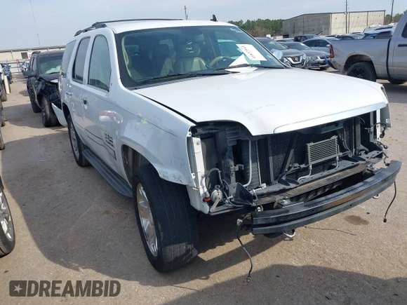 2011 GMC Yukon SLT with VIN 1GKS1CE03BR347941, listed as a IAAI auction lot 41637343 with 198,830 mi miles. Bid and sale history available at carsss.com. Image 1.