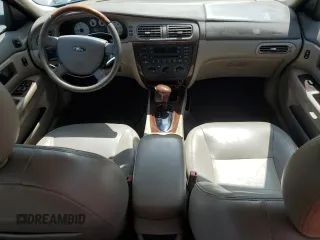 2006 Ford Taurus SEL z VIN 1FAFP56U46A209165, wystawiony jako Copart lot #56004955 z przebiegiem 52 057 mil mil oraz Czysty tytuł • Clean title. Historia ofert i sprzedaży dostępna na DreamBid. Obrazek 8.