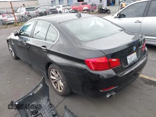 2015 BMW 5 Series 528i with VIN WBA5A5C56FD514814, listed as a IAAI auction lot 42052381 with 76,306 mi miles. Bid and sale history available at carsss.com. Image 3.