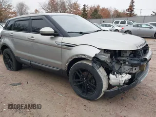 2014 Land Rover Range Rover Evoque Pure Plus with VIN SALVP2BG5EH893212, listed as a IAAI auction lot 41666759 with 158,489 mi miles. Bid and sale history available at carsss.com. Image 1.