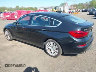 2014 BMW 5 Series GT 535i Gran Turismo xDrive with VIN WBA5M4C56ED183815, listed as a IAAI auction lot 42155348 with 150,357 mi miles and . Bid and sale history available at carsss.com. Image 6.