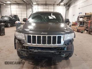 2011 Jeep Grand Cherokee 70th Anniversary with VIN 1J4RR4GG3BC745652, listed as a IAAI auction lot 41133698 with 217,948 mi miles. Bid and sale history available at carsss.com. Image 12.