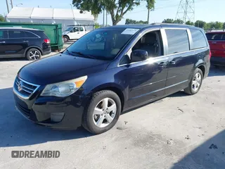 2011 Volkswagen Routan SE with VIN 2V4RW3DG5BR668194, listed as a IAAI auction lot 42483379 with 203,945 mi miles and . Bid and sale history available at DreamBid. Image 17.