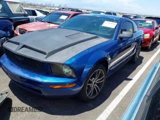 2007 Ford Mustang Deluxe z VIN 1ZVFT80N975241366, wystawiony jako IAAI lot #42408850 z przebiegiem 193 336 mil mil oraz . Historia ofert i sprzedaży dostępna na DreamBid. Obrazek 2.