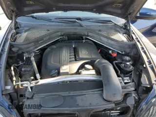 2013 BMW X5 xDrive35i with VIN 5UXZV4C54D0E08810, listed as a Copart auction lot 51255265 with 98,227 mi miles and Salvage Title. Bid and sale history available at carsss.com. Image 12.